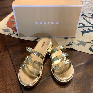 Michael Kors gold slides